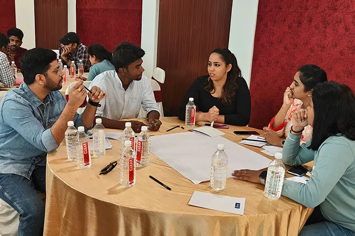 Team members in a collaborative discussion